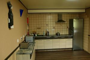 Kuchyň nebo kuchyňský kout v ubytování Guesthouse Männiku