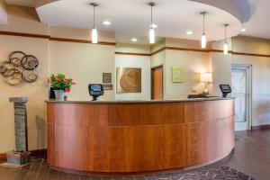 a lobby with a reception counter at a hospital at Comfort Suites Urbana Champaign, University Area in Champaign +41 photos