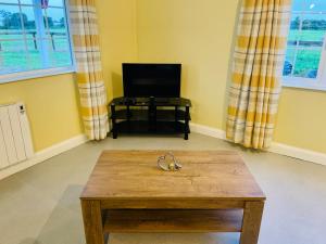 TV o dispositivi per l'intrattenimento presso Ashfield Cottage
