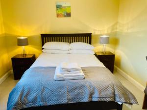 Letto o letti in una camera di Ashfield Cottage
