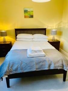 Letto o letti in una camera di Ashfield Cottage