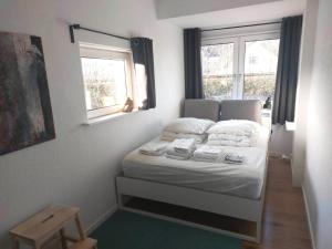Postelja oz. postelje v sobi nastanitve Nordic style apartment in central Aalborg