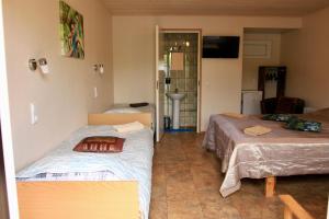 Postel nebo postele na pokoji v ubytování Guesthouse Männiku