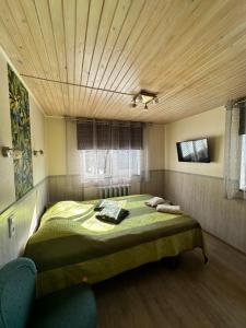 Postel nebo postele na pokoji v ubytování Guesthouse Männiku