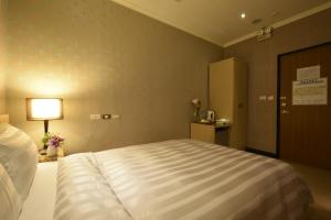 Letto o letti in una camera di A casa Hotel