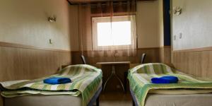 Postel nebo postele na pokoji v ubytování Guesthouse Männiku