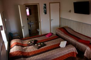 Postel nebo postele na pokoji v ubytování Guesthouse Männiku
