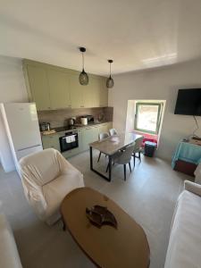 Kuchyň nebo kuchyňský kout v ubytování Happy Holiday House Hava