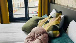 Postel nebo postele na pokoji v ubytování Hotel Sutor