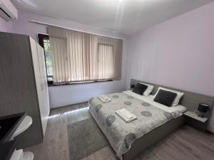 A bed or beds in a room at Saraya