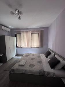 A bed or beds in a room at Saraya