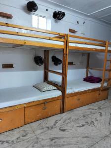 A bed or beds in a room at Jungle by sturmfrei Pushkar