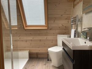 Koupelna v ubytování Owl Glamping Pod + 5 fotografií