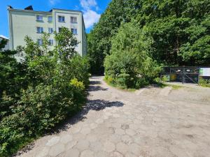 Vonkajšia záhrada v ubytovaní Apartament Przy Lesie + 2 fotografie