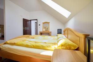 Postel nebo postele na pokoji v ubytování Ferienhaus SWD