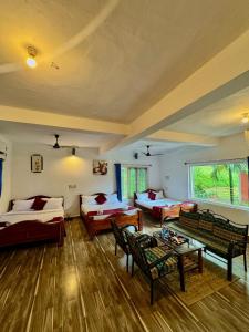 Postel nebo postele na pokoji v ubytování Coorg Nest Cottages By Dreamy Vacations