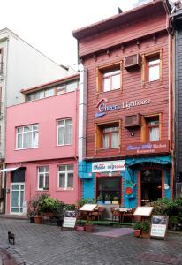a group of buildings on a city street at Cheers Lighthouse in Istanbul