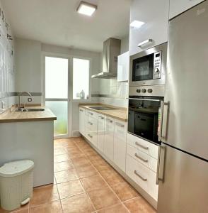 Køkken eller tekøkken på Chipiona - Playa a 200m terraza piscina padel