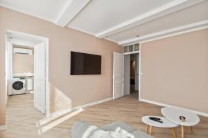 TV a/nebo společenská místnost v ubytování Cœur de Vidauban - Appt climatisé proche activités