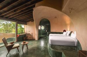 Ένα ή περισσότερα κρεβάτια σε δωμάτιο στο Reu Boutique Hotel +31 φωτογραφίες