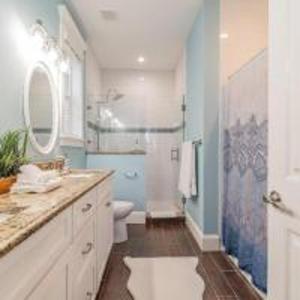 a bathroom with a sink and a toilet and a shower at Playa Esmeralda Home! Bradenton Beach Now Open!!! in Bradenton Beach