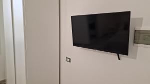 TV a/nebo společenská místnost v ubytování La Casa di Sayf + 22 fotografií