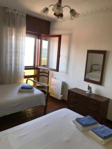 Postel nebo postele na pokoji v ubytování Aires de Playa