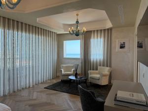 Posezení v ubytování Grand Hotel Gallia