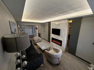 TV a/nebo společenská místnost v ubytování BÇ Ruby Hotel + 31 fotografií