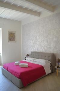 Postel nebo postele na pokoji v ubytování Allegra Toscana - Affittacamere Guest house Arezzo