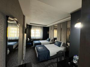 Posteľ alebo postele v izbe v ubytovaní BÇ Ruby Hotel