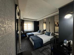 Posteľ alebo postele v izbe v ubytovaní BÇ Ruby Hotel