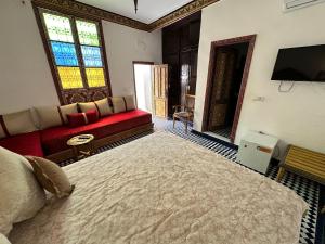 Postel nebo postele na pokoji v ubytování Riad Shama Fes + 37 fotografií