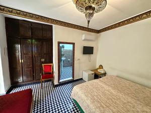 Postel nebo postele na pokoji v ubytování Riad Shama Fes