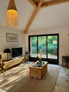 Μια τηλεόραση ή/και κέντρο ψυχαγωγίας στο Maison en bois Lacanau centre