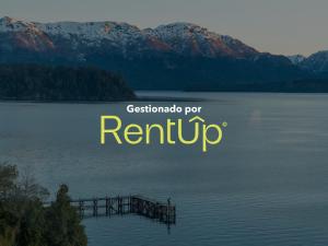a picture of a lake with the word return up at Rent Up - Bariloche, Casa a pasos del Centro Civico in San Carlos de Bariloche