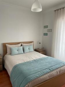 Ένα ή περισσότερα κρεβάτια σε δωμάτιο στο West Soul Village