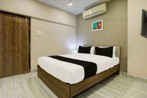 Postel nebo postele na pokoji v ubytování Super Hotel O Luxe Villa