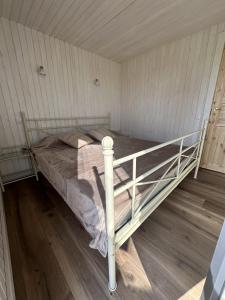 Postel nebo postele na pokoji v ubytování Mežmalas atpūtas bāze