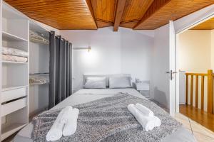 Rúm í herbergi á Gallarate Central Suite