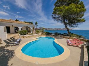 Una villa con piscina y vistas al mar. en AVANOA - Cabo Palos Moraira, en Cap Blanc 44 fotos más