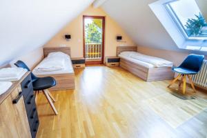 Postel nebo postele na pokoji v ubytování Wohlfühlhotel Sonnengarten
