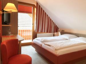 Postel nebo postele na pokoji v ubytování Wohlfühlhotel Sonnengarten