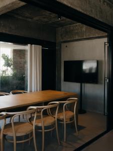 TV a/nebo společenská místnost v ubytování Jiangnan House Nantou
