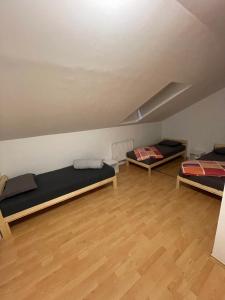Postel nebo postele na pokoji v ubytování Rest Nest