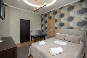 Katil atau katil-katil dalam bilik di IRIS Hotel