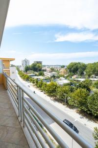 a balcony with a view of a street at Emigres Apartments Vlore in Vlorë