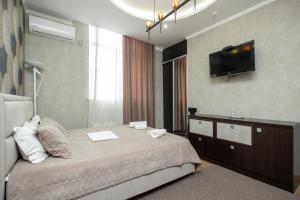 Katil atau katil-katil dalam bilik di IRIS Hotel