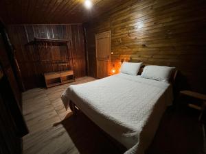 Ένα ή περισσότερα κρεβάτια σε δωμάτιο στο Casa Malacara nos Canyons