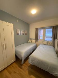 Ένα ή περισσότερα κρεβάτια σε δωμάτιο στο Appartement Westhinder te Middelkerke